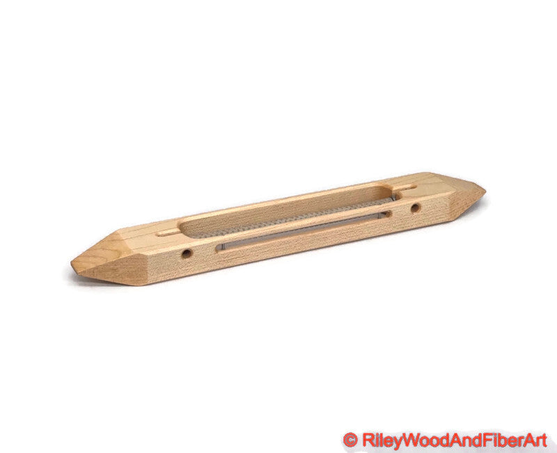 10 inch Maple open bottom boat shuttle with a white background