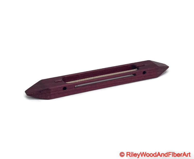 10 inch Purple Heart open bottom boat shuttle with a white background