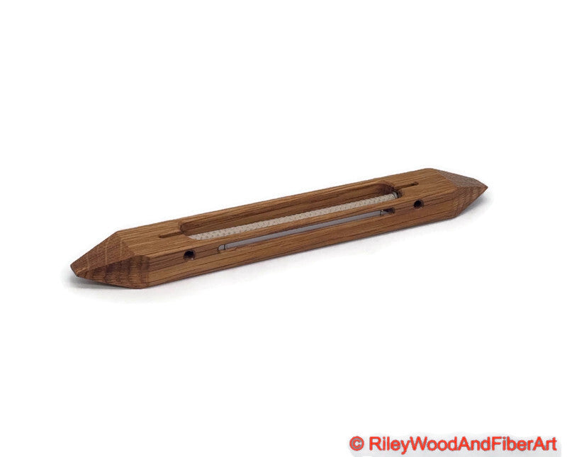 10 inch Quartersawn White Oak open bottom boat shuttle with a white background