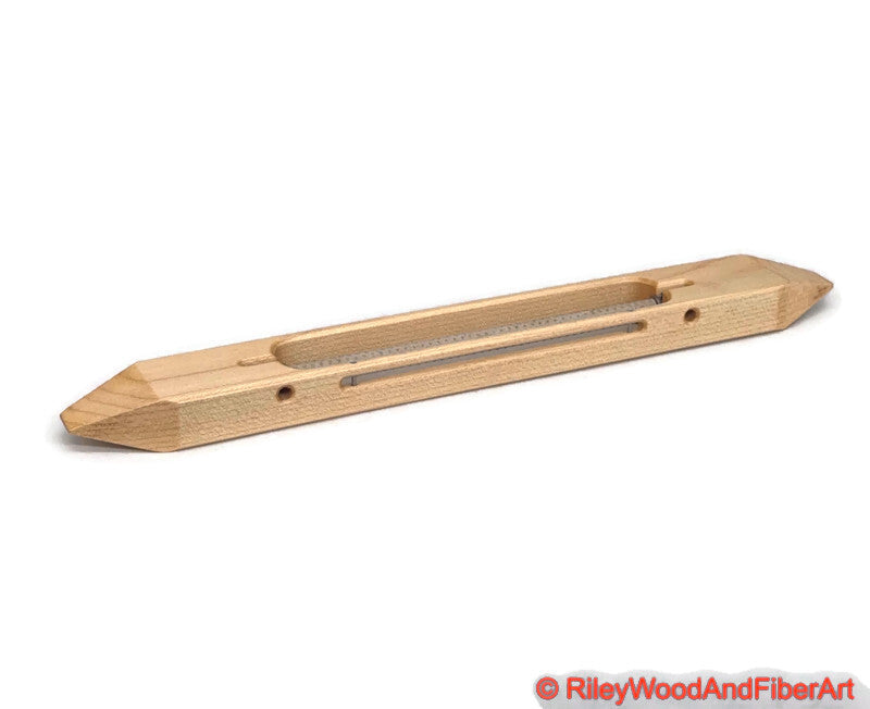 12 inch Maple open bottom boat shuttle with a white background