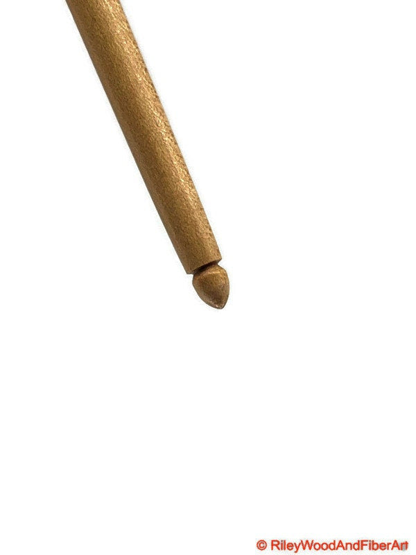 Top Whorl Drop Spindle - African Mahogany, Black Palm, Maple - 29g on white background