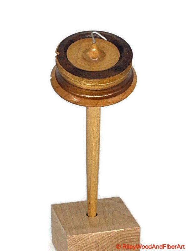 Top Whorl Drop Spindle - Walnut, Maple & Teak - 39g on white background