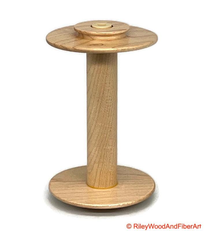 Spinning Wheel Bobbins Made by Riley Wood and Fiber Art