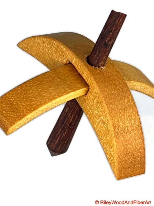 Mini Turkish Drop Spindle - Quartersawn Avodire Whorl with Walnut Shaft on white background