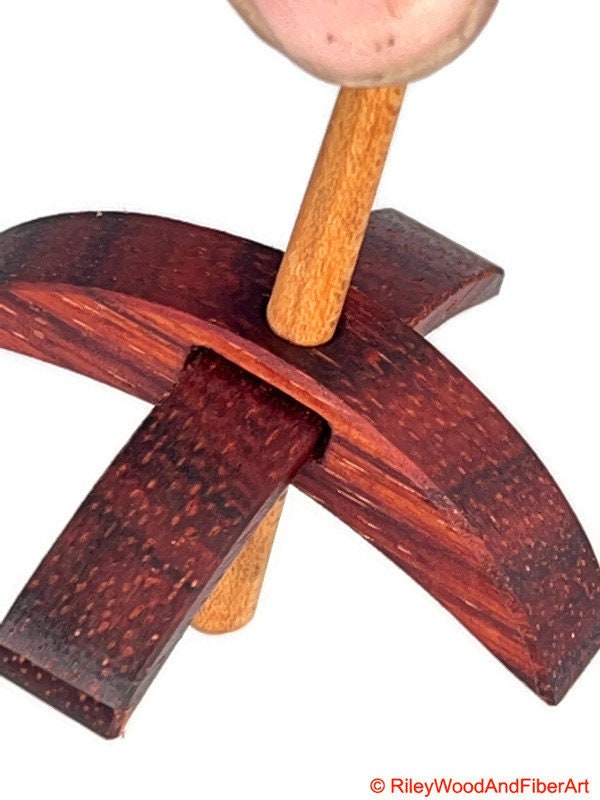 Mini Turkish Drop Spindle - Padauk Whorl with Maple Heartwood Shaft on white background