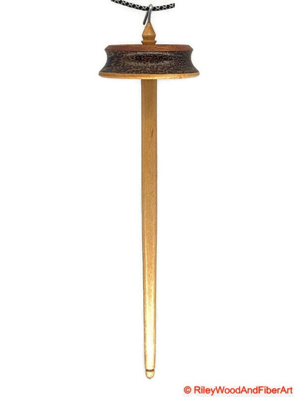 Top Whorl Drop Spindle - African Mahogany, Black Palm, Maple - 29g on white background