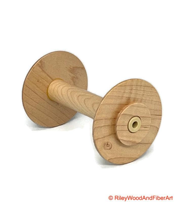 Spinning Wheel Bobbins Made by Riley Wood and Fiber Art