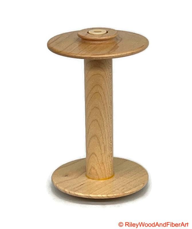Spinning Wheel Bobbins Made by Riley Wood and Fiber Art