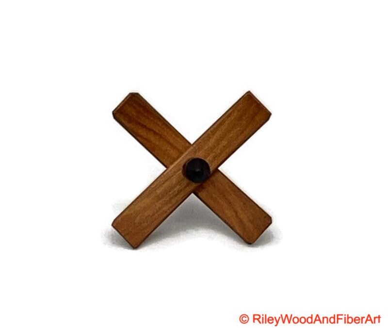 Mini Turkish Drop Spindle - Cherry Whorl with Jobillo Shaft on white background