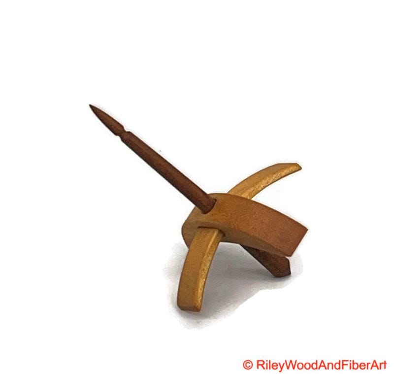 Mini Turkish Drop Spindle - Quartersawn Avodire Whorl with Maple Heartwood Shaft on white background