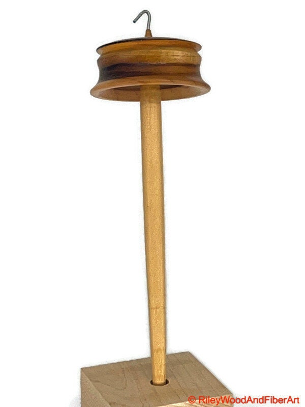 Top Whorl Drop Spindle - Walnut, Maple & Teak - 39g on white background