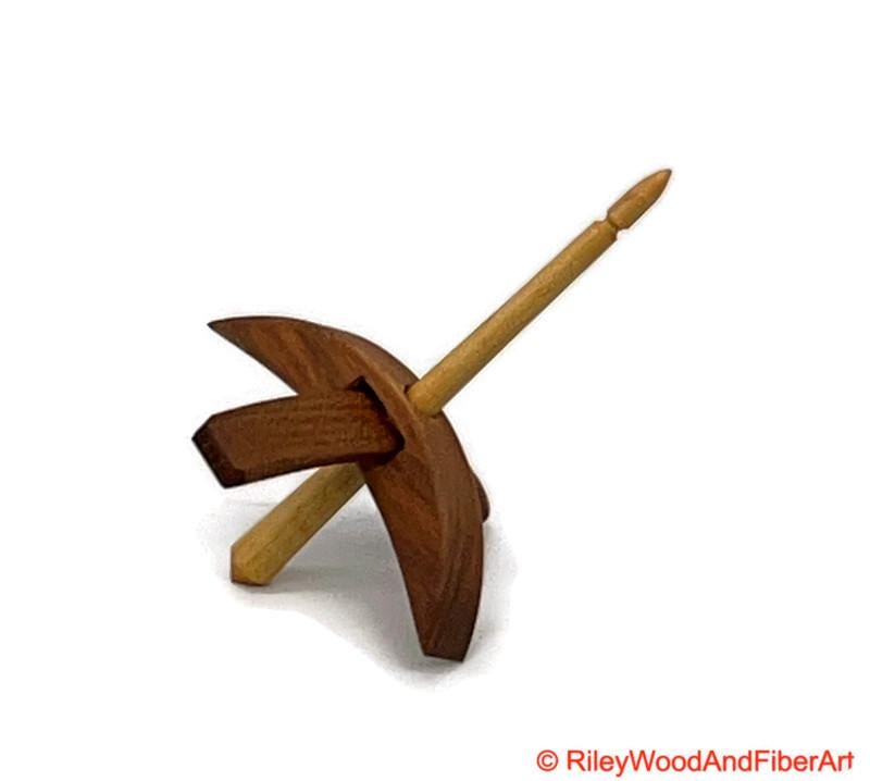 Mini Turkish Drop Spindle - Cherry Whorl with Curly Maple Shaft on white background