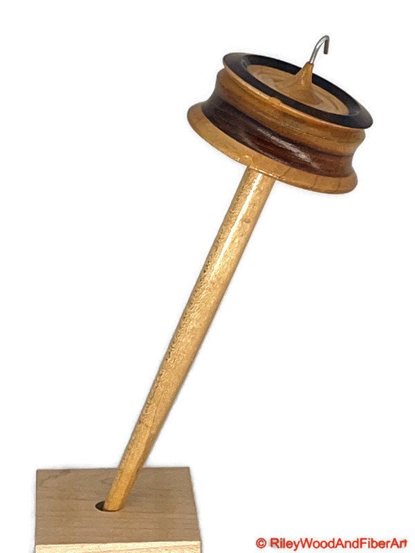 Top Whorl Drop Spindle - Walnut, Maple & Teak - 39g on white background