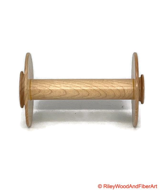 Spinning Wheel Bobbins Made by Riley Wood and Fiber Art