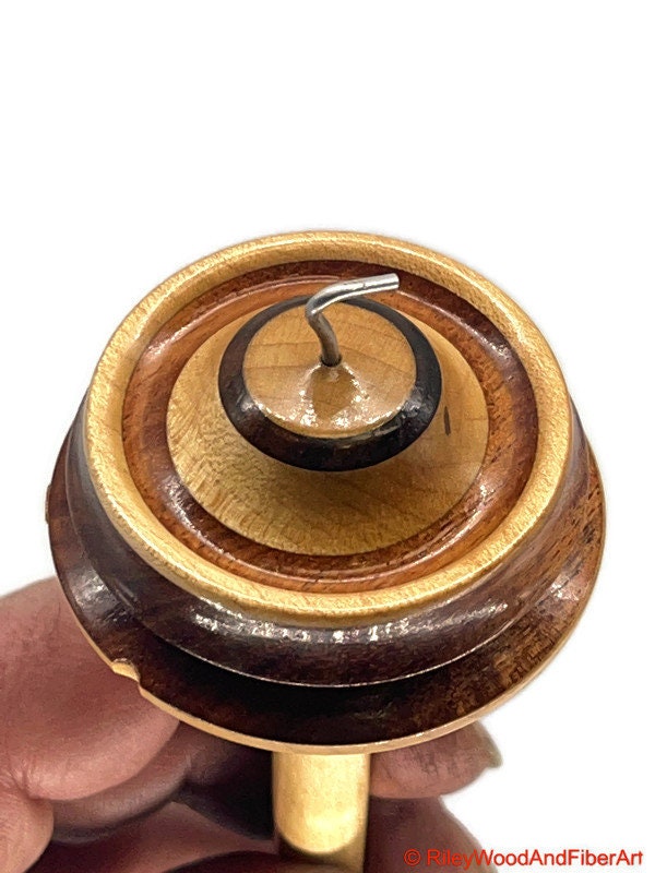 Top Whorl Drop Spindle - Walnut, Maple & Allo - 33g on white background