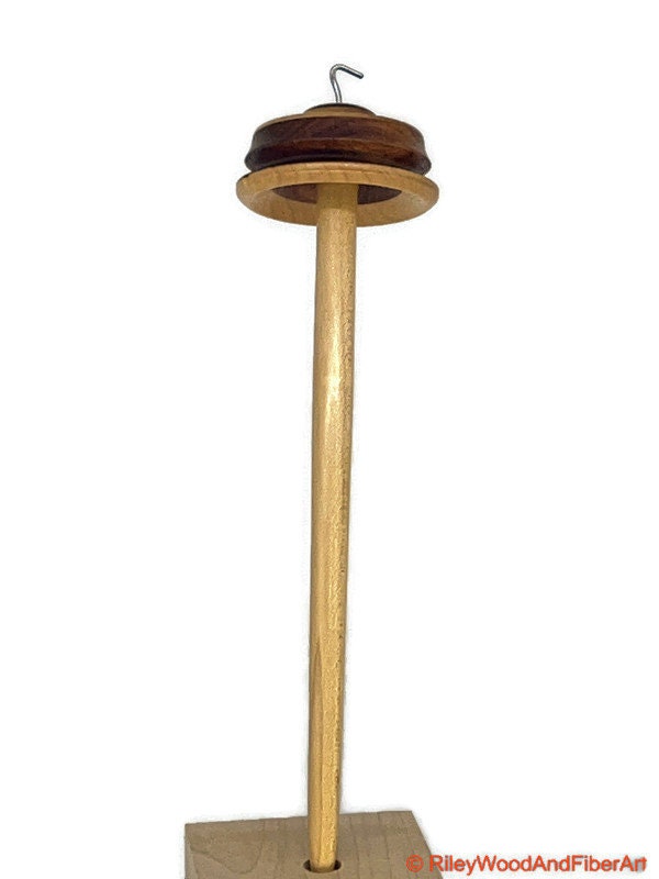Top Whorl Drop Spindle - Walnut, Maple & Allo - 33g on white background