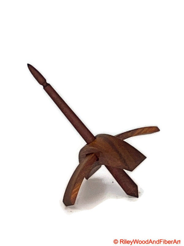Mini Turkish Drop Spindle - Canary Whorl with Red Heart Shaft on white background