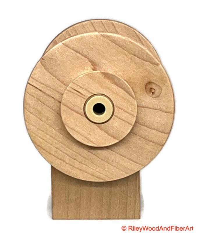 Spinning Wheel Bobbins Made by Riley Wood and Fiber Art