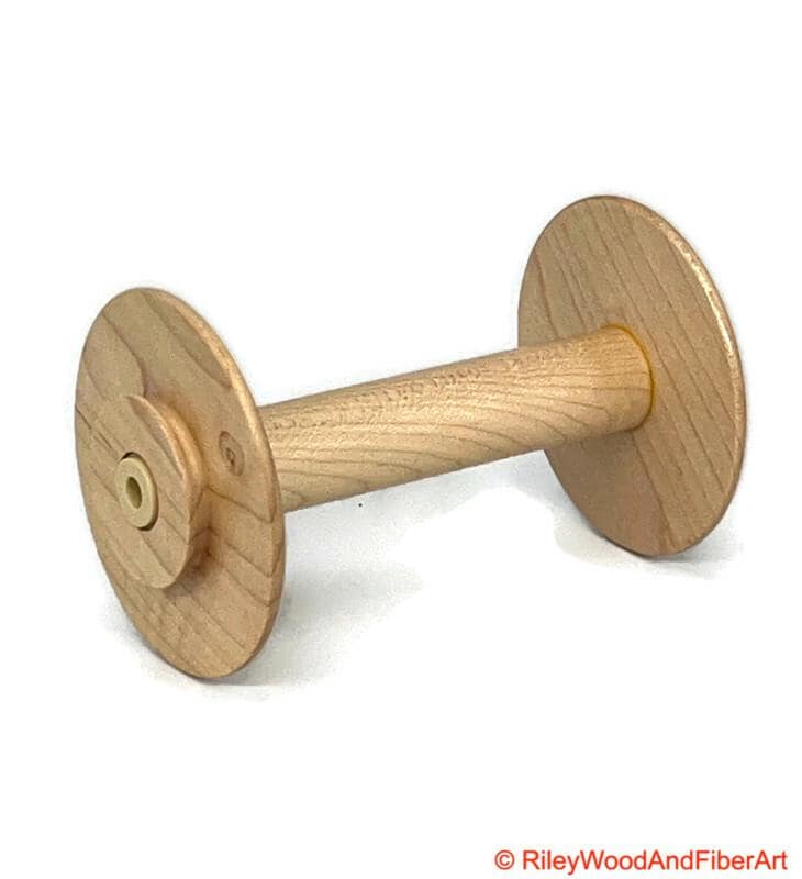 Spinning Wheel Bobbins Made by Riley Wood and Fiber Art