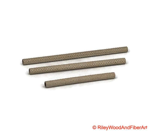Cardboard Weaving Quills - Boat Shuttle Bobbins on white background