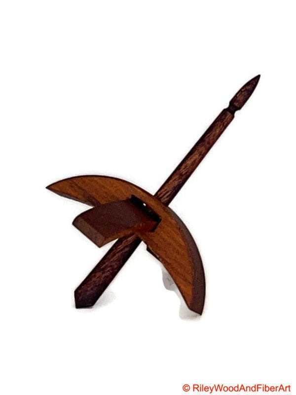Mini Turkish Drop Spindle - Cherry Whorl with Chechen Shaft on white background