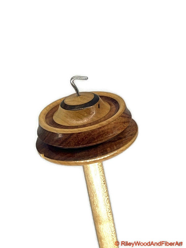 Top Whorl Drop Spindle - Walnut, Maple & Allo - 33g on white background