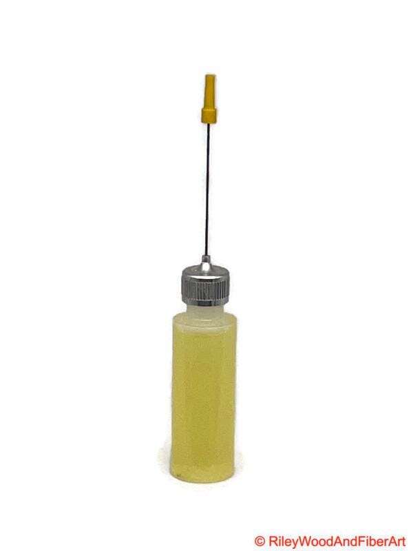 Oil Bottle with Precision Needle Tip on white background
