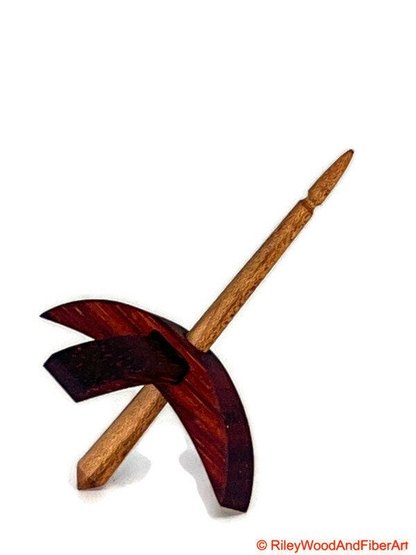 Mini Turkish Drop Spindle - Padauk Whorl with Maple Heartwood Shaft on white background