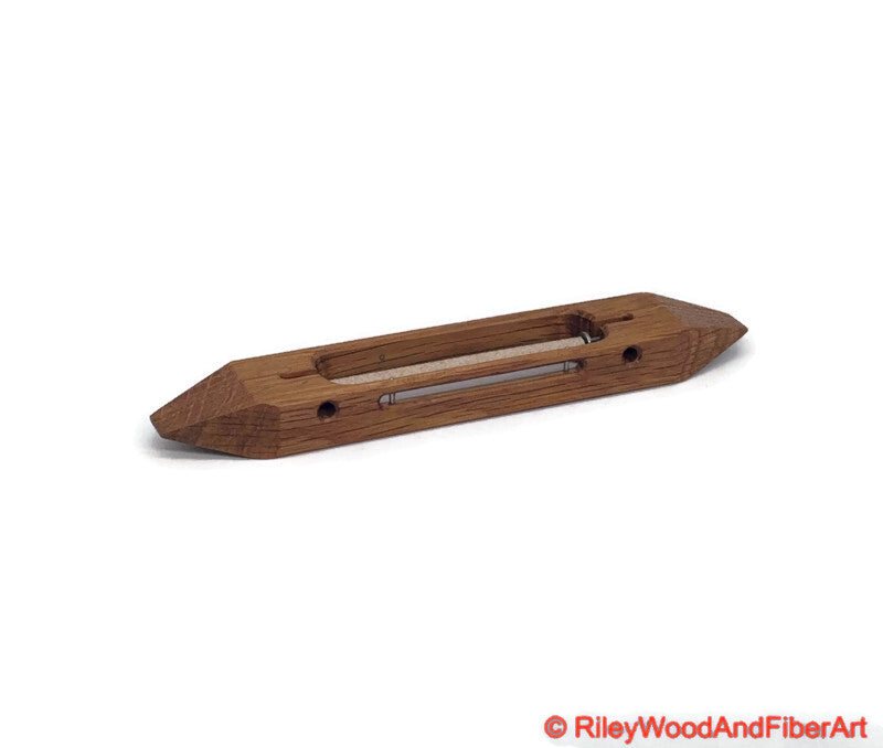 8 inch Quartersawn White Oak open bottom boat shuttle with a white background