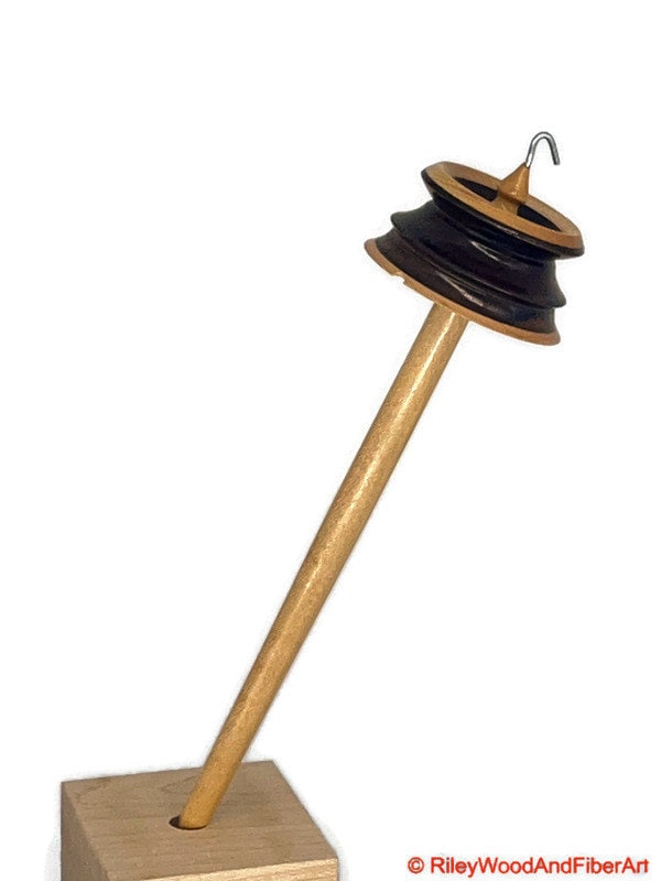 Top Whorl Drop Spindle - Walnut & Maple - 29g on white background