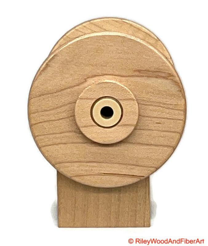 Spinning Wheel Bobbins Made by Riley Wood and Fiber Art