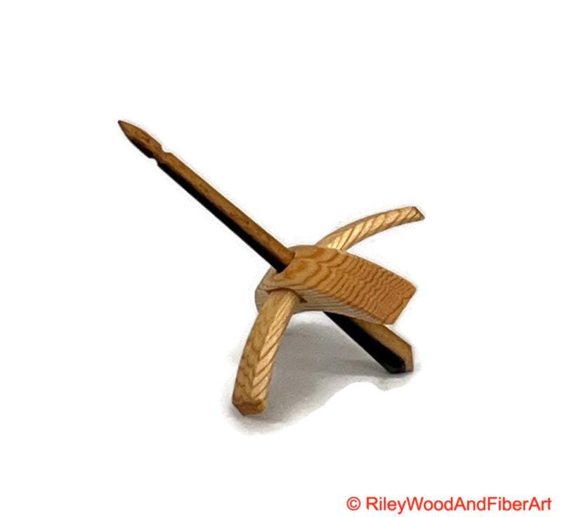 Mini Turkish Drop Spindle - Sitka Spruce Whorl with Black and White Ebony Shaft on white background