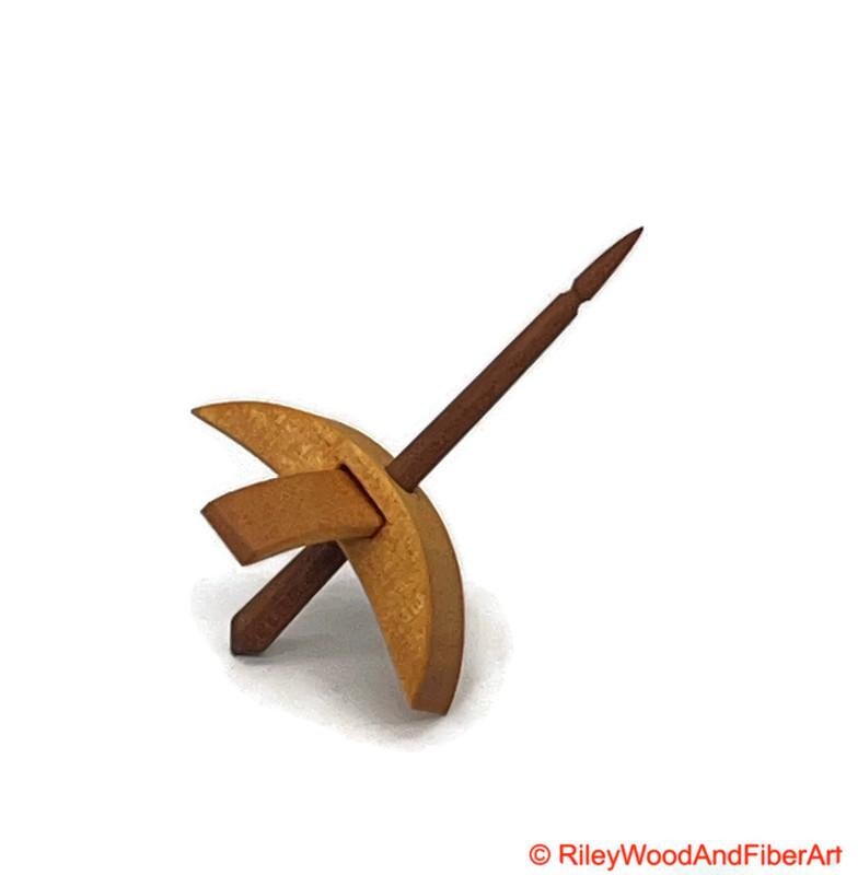 Mini Turkish Drop Spindle - Quartersawn Avodire Whorl with Maple Heartwood Shaft on white background