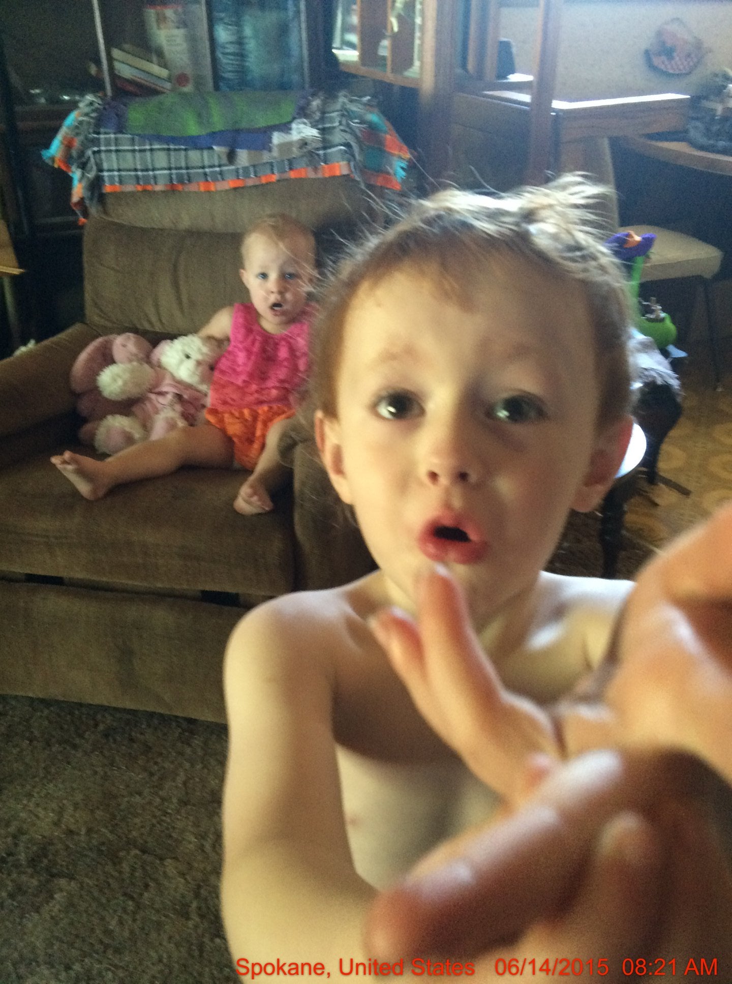 In this photo I have casted a spell and the kids are both mystified looking.