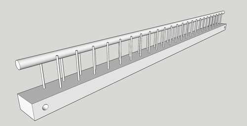 24 inch weaving raddle consists of a flat board with two rows of offset nails protruding vertically with a 3/8 inch dowel in between