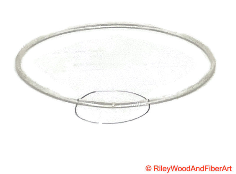 a length of clear 3/32" polyurethane drive band material fused