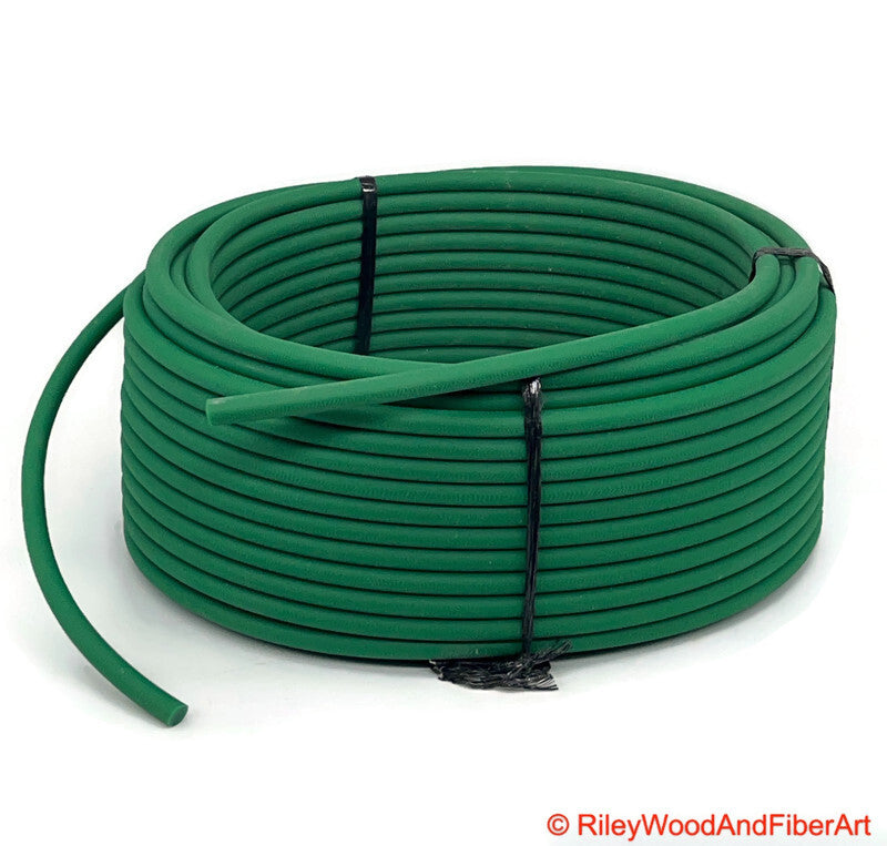 a length of green 1/4" polyurethane drive band material