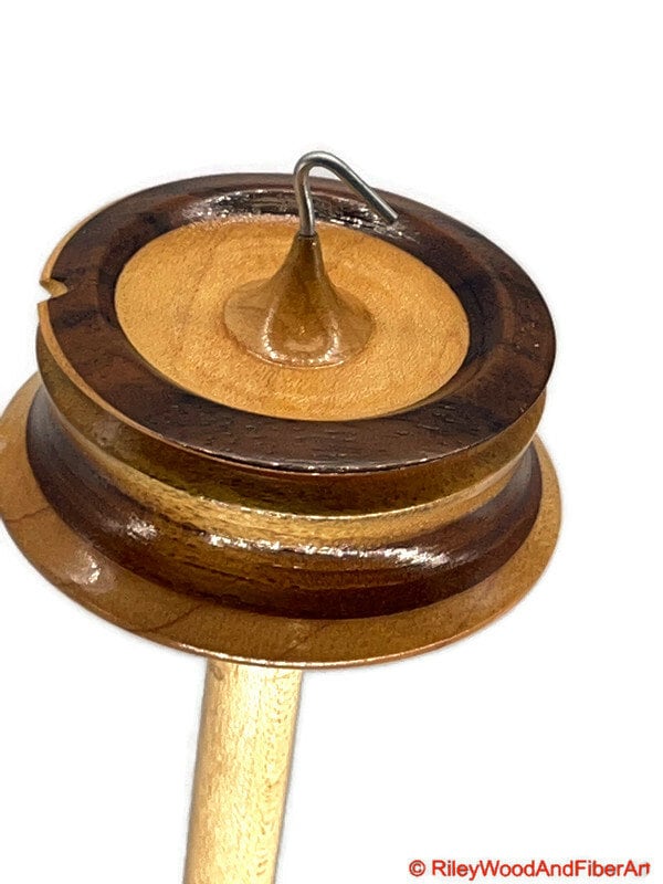 Top Whorl Drop Spindle - Walnut, Maple & Teak - 39g on white background