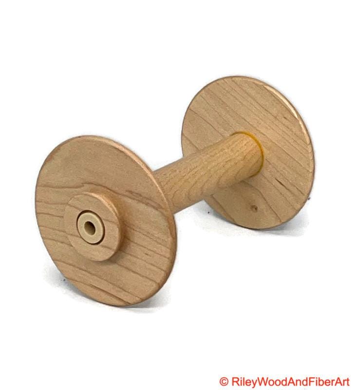 Spinning Wheel Bobbins Made by Riley Wood and Fiber Art