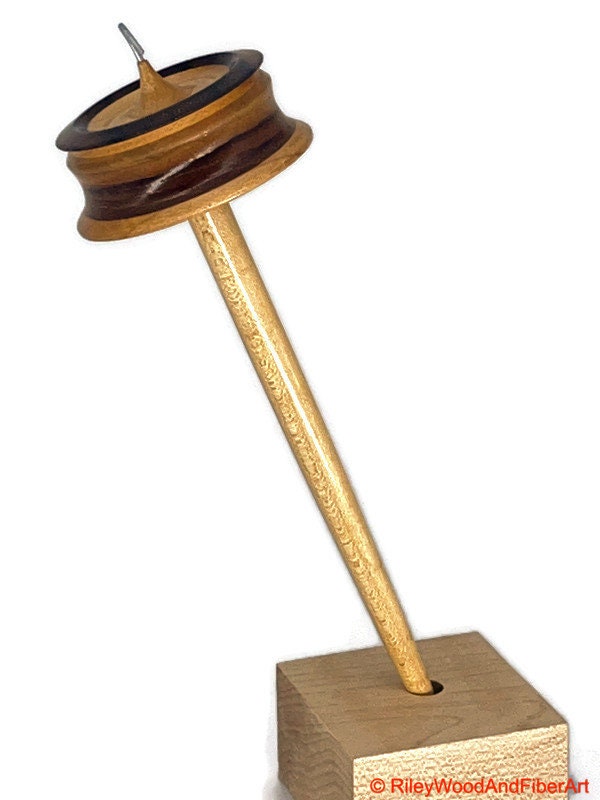 Top Whorl Drop Spindle - Walnut, Maple & Teak - 39g on white background