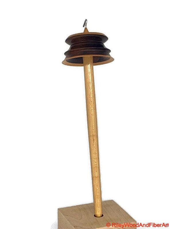 Top Whorl Drop Spindle - Walnut & Maple - 29g on white background