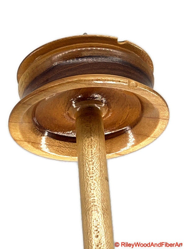 Top Whorl Drop Spindle - Walnut, Maple & Teak - 39g on white background