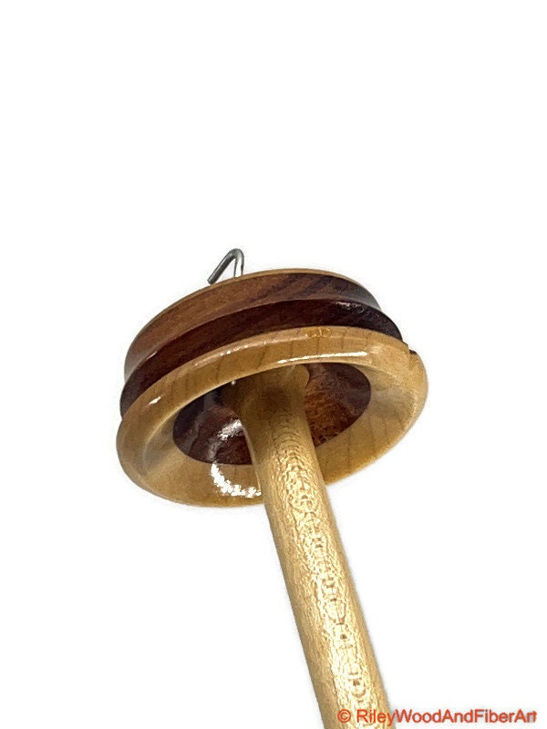 Top Whorl Drop Spindle - Walnut, Maple & Allo - 33g on white background