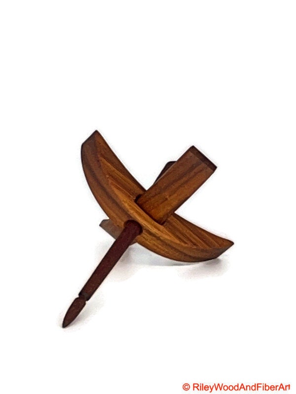 Mini Turkish Drop Spindle - Canary Whorl with Red Heart Shaft on white background
