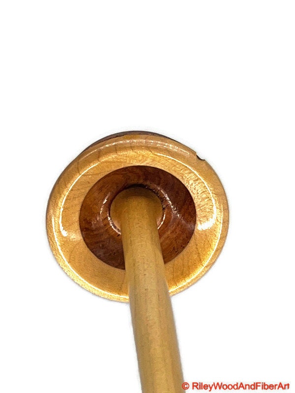 Top Whorl Drop Spindle - Walnut, Maple & Allo - 33g on white background