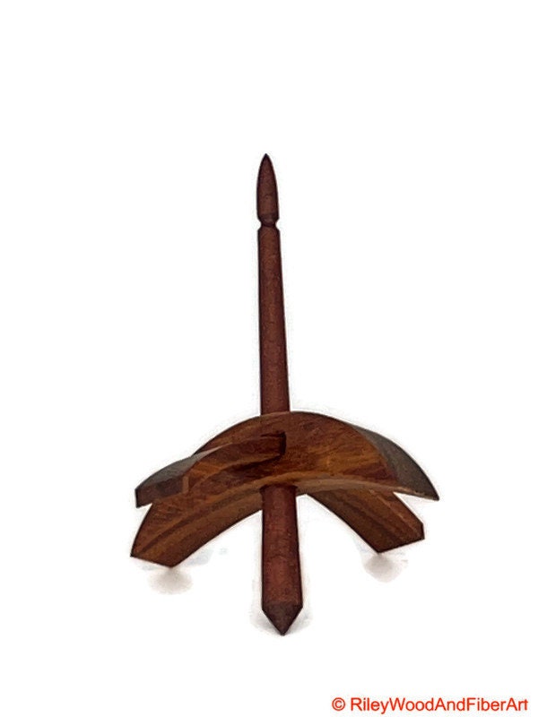 Mini Turkish Drop Spindle - Canary Whorl with Red Heart Shaft on white background