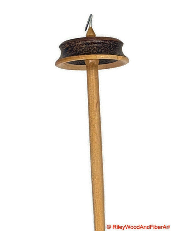 Top Whorl Drop Spindle - African Mahogany, Black Palm, Maple - 29g on white background