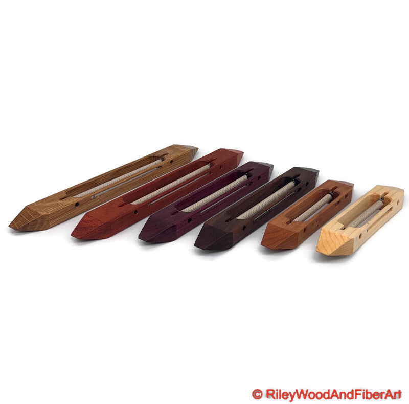 a array of open bottom boat shuttles sitting next to each other with a white background